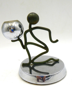 Lot 350 - Art Deco Candle Holder - stylised figure with chrome & patinated