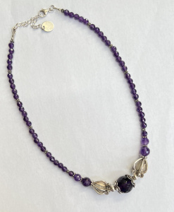 Lot 297 - Silver and cut faceted Amethyst bead necklace