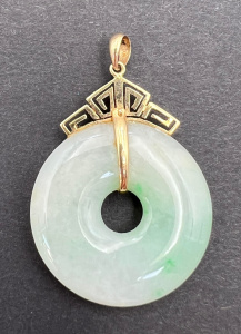 Lot 317 - Chinese pale green Jade safety coin pendant with 14ct gold mount and f