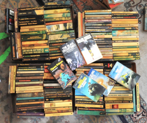 Lot 21 - 4 x Boxes of Vintage Paperback Sci-Fi Novels incl Authors such As Larry