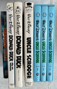 Lot 34 - 7 x hc Walt Disney Books incl 3 vol set Uncle Scrooge & Donald Duck