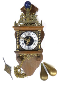 Lot 237 - Vintage Franz Hermle Atlas wooden and Brass Wall clock with figure of