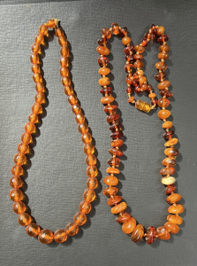 Lot 313 - 2 x vtg amber necklaces - tumbled & faceted