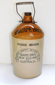 Lot 323 - Vintage Stoneware Demijohn - Sharpe Bros - featuring Hands across the