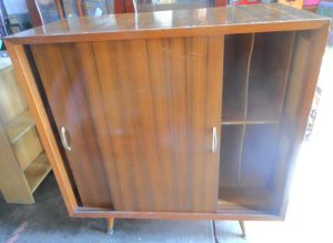 Mid-century 14-slot Record Cabinet with splade metal capped feet and striped ven