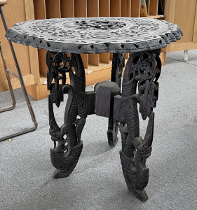 Lot 7 - Vintage ebonised Indian heavily carved Table - tripod folding base
