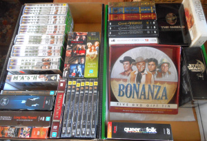 Lot 62 - 2 x Boxes DVD Movie Box Sets, incl MASH, The Shield tin, Bonanza tin, T