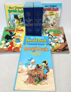 Lot 163 - 2 x Walt Disney HC Book 3 vol sets - The Carl Barks Library of Donal