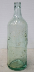 Lot 217 - Vintage clear glass Bottle for W E Clancey, Nyngan