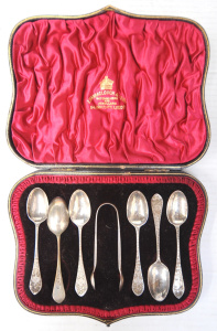 Lot 308 - Cased 1894 SSterling decorative teaspoons with sugar tongs - hmarked L