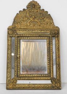 Lot 127 - c1900s Dutch Brass Repousse Cushion Mirror cabinet with two original