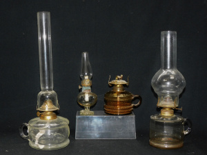 Lot 291 - Vintage Glass Oil Lamps all with brass fittings inc Amber, Clear Glass