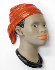Lot 348 - Mid Century Ceramic Wall Plaque - Eastern lady with Orange head Scarf