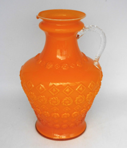 Lot 361 - Mid Century Italian Empoli Orange Opalina Glass Jug - clear twisted ha
