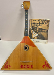 Lot 257 - Russian Balalaika string wooden instrument with method Booklet - poss