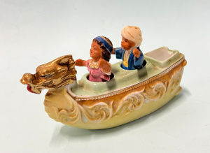 Lot 343 - 1950s novelty ceramic cruet - dragon boat with two nodding figures - m