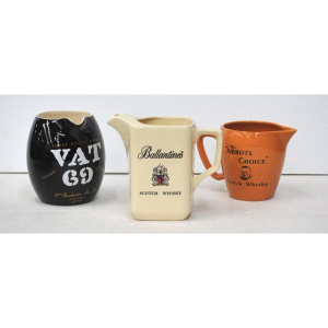 Lot 259 - 3 x Wade England Ceramic Whisky Water Jugs inc Vat 69, Ballentines &a