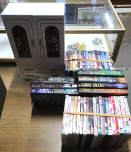 Lot 14 - Box Lot incl Mixed DVDs, Assorted Mystery Novels, Dolls House Dresser e