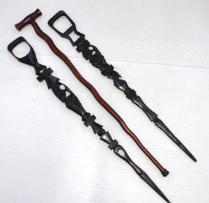 Lot 200 - 2 x vintage walking sticks inc Two carved ebony & stained wooden