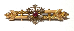 Lot 297 - c1900 9ct gold double bar brooch with filigree heart sets with seed pe