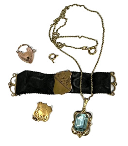 Lot 299 - Mixed lot - 9ct gold shield on black grosgrain, 9ct shield pt cufflink