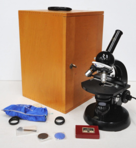 Lot 93 - Cased Vintage Carl Zeiss Microscope w Three Lenses, Light Source &