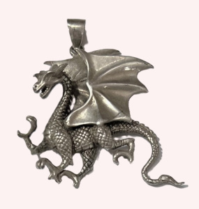 Lot 253 - Large ornate silver Dragon pendent