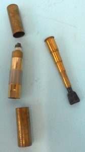 Lot 279 - Vintage 2 piece Royden lipstick-style cigarette lighter with telescopi