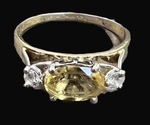 Lot 301 - 18ct gold & platinum Ring high set with oval Citrine and diamond e