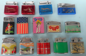 Lot 181 - Group Colourful Retro-designs Cigarette Lighters, incl Penguin (made i