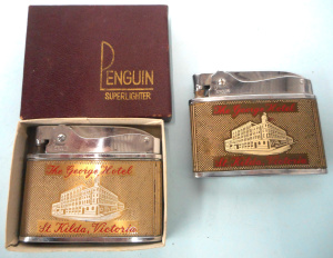 Lot 285 - 2 x Penguin Superlighter Cigarette Lighters (one in original box) adve