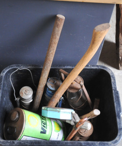 Lot 64 - Box Lot of Assorted Tools & Tins incl Axes, Oil Lamps, Assorted Har