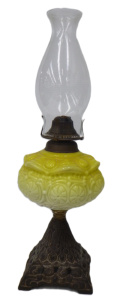 Lot 201 - C1900 Oil Lamp with ornate metal base, chimney and a custard glass fon