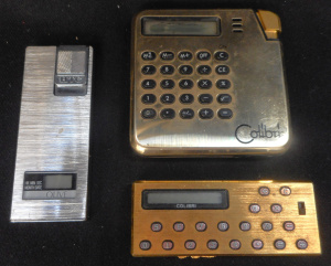Lot 239 - Group lot Novelty Desk-top Cigarette lighters, incl 2 x Colibri Calcul
