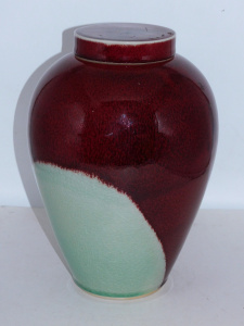 Lot 332 - Chris Sanders Australian Pottery Lidded Vessel Deep Red mottle and Cel