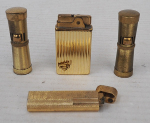 Lot 295 - 4 x Vintage Gold Tone Cigarette Lighters incl Wind Up Musical Cigarett