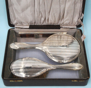 Lot 298 - Boxed SSilver ladies Toilet set - hair brush, mirror, comb (af) - Hma