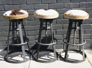 Lot 2 - 3 x Vintage Cowhide Bar Stools - strong, heavy, adjustable metal bases,