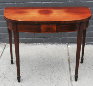 Lot 7 - Georgian Mahogany fold over card table with inlaid sides & tapering