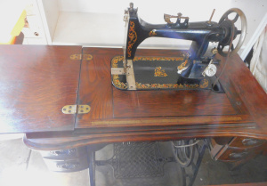 Lot 78 - Vintage Tyanko Treadle Sewing Machine in 4-drawer Cabinet