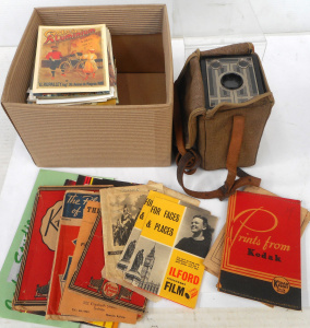 Lot 125 - Box containing Brownie Junior camera, Vintage photo envelopes, and lar