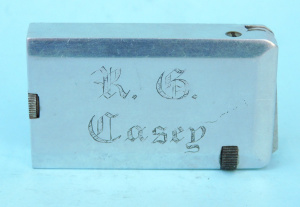 Lot 287 - Vintage Silver toned engraved cigarette lighter - K G Casey - Richard