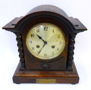 Lot 315 - C 1920 Mantel Clock - Dark stained Oak with barley twist columns, pend