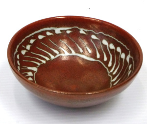 Lot 349 - Australian Shigeo Shiga Stoneware Pottery bowl - tomato glaze with whi