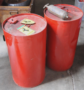 Lot 26 - Group lot - Motoring items - 2 x large Red painted Fuel Drums, old Bras
