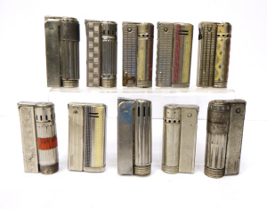 Lot 48 - Group lot of Vintage Fuel Fired Cigarette Lighters - all silver toned,