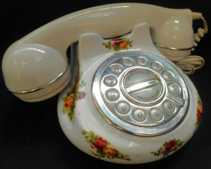 Lot 336 - Royal Albert - Old Country Roses - Porcelaine Dial Rotary Telephone by