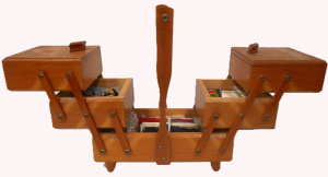 Lot 5 - 1960s Expandable wooden Sewing box and Contents