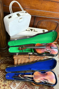 Lot 48 - Grp - 60s white suitcase, vanity case, picnic basket & 2 Violins wi