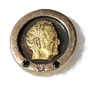 Lot 299 - 10K Gold John Deere gold service lapel pin with small diamond & 2